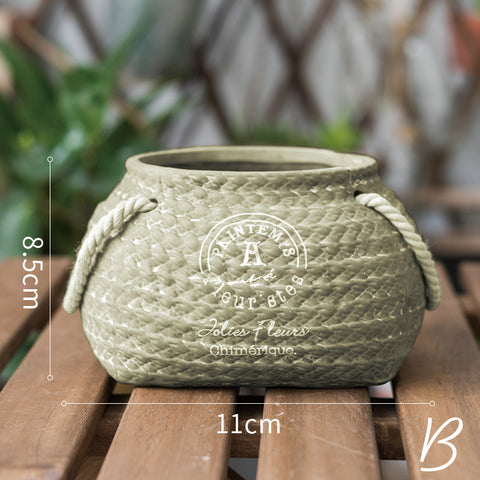 Woven pocket pottery flower pot